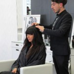 A woman getting her hair done in a salon.