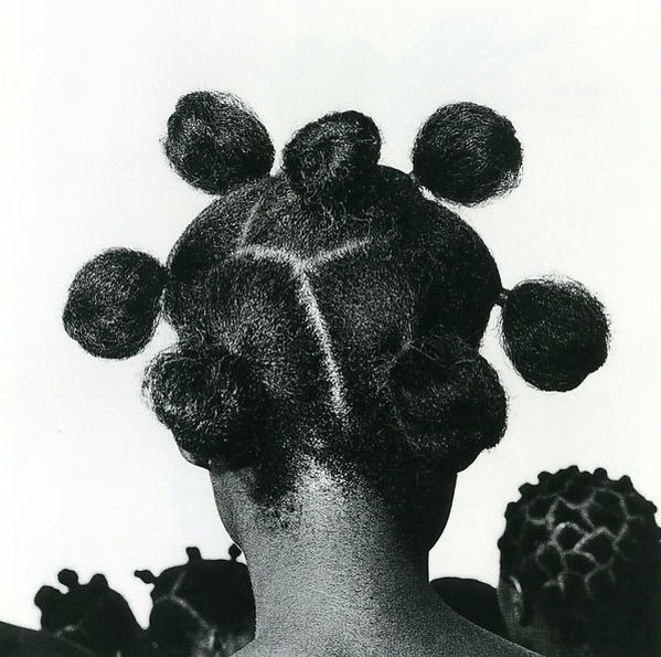 A black and white photo of a woman's hair.